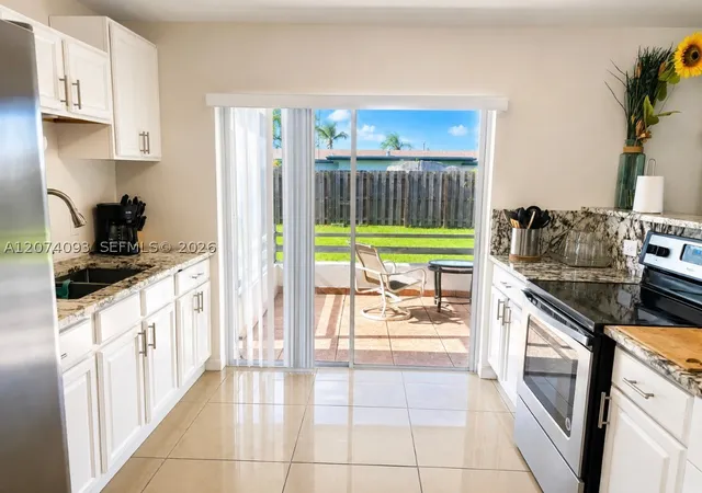 Photo 2 of Single family home for sale at 9331 Nw 24th Pl, Sunrise, FL 33322 | MLS# A12074093 | Listing updated on 2026-10-07