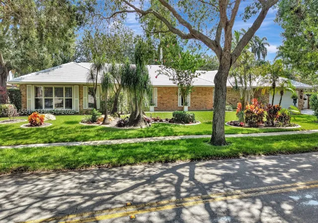 Photo 2 of Single family home for sale at 560 W Tropical Way, Plantation, FL 33317 | MLS# A12074551 | Listing updated on 2026-10-09