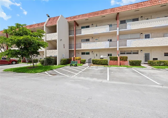 Photo 1 of Condo for sale at 811 S Hollybrook Dr #105, Pembroke Pines, FL 33025 | MLS# A12071385 | Listing updated on 2026-10-09