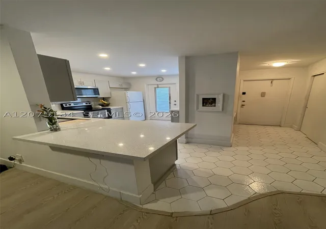Photo 1 of Condo for sale at 1000 Ne 14Th Ave #211, Hallandale Beach, FL 33009 | MLS# A12075134 | Listing updated on 2026-09-24