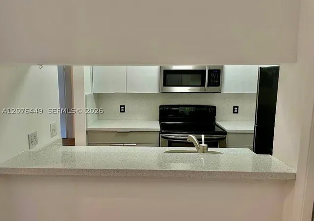 Listing Photo 3 - Condo for sale in building located at 4421 W Mcnab Rd, Pompano Beach, FL 33069 - Unit #20