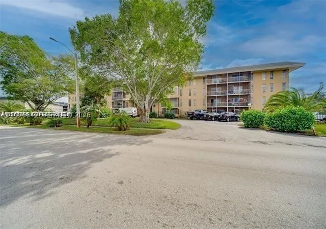 Listing Photo 1 - Condo for sale in building located at 4848 Nw 24Th Ct, Lauderdale Lakes, FL 33313 - Unit #230