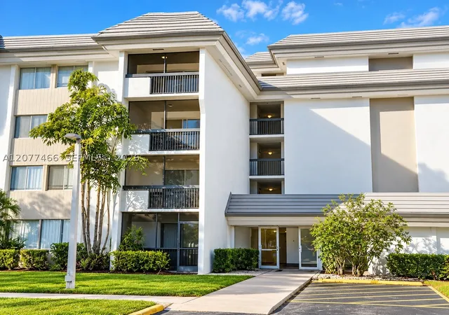 Listing Photo 1 - Condo for sale in building located at 721 N Pine Island Rd, Plantation, FL 33324 - Unit #213