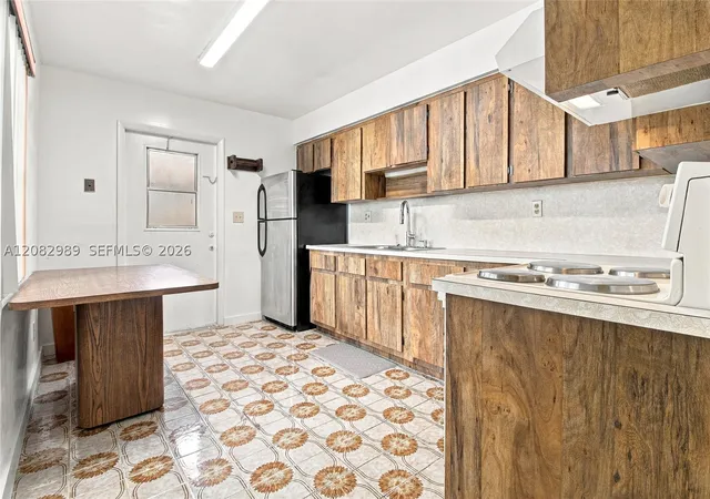 Photo 3 of Multi family home for sale at 18 Sw 13th Street, Dania Beach, FL 33004 | MLS# A12082989 | Listing updated on 2026-09-24