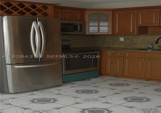 Photo 2 of Multi family home for sale at 941 Nw 102nd Street, Miami, FL 33150 | MLS# A12084370 | Listing updated on 2026-09-28