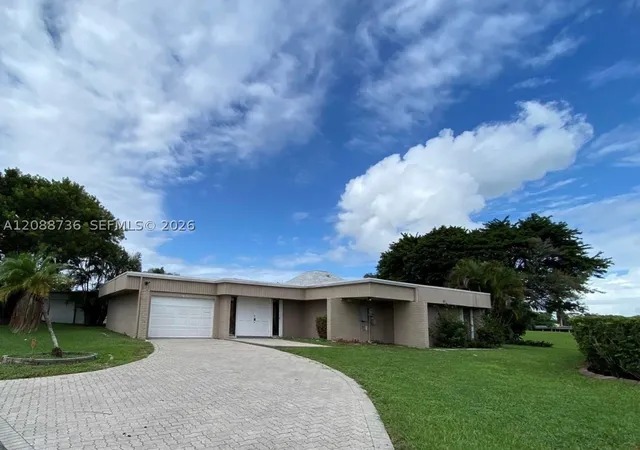Photo 1 of Single family home for sale at 6105 Royal Poinciana Ln, Tamarac, FL 33319 | MLS# A12088736 | Listing updated on 2026-10-07