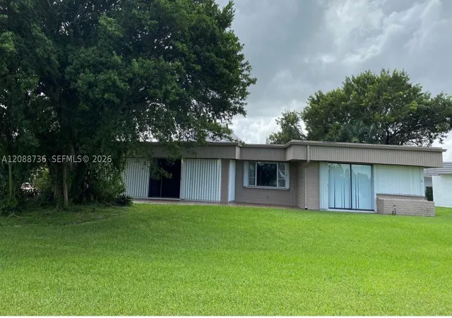 Photo 2 of Single family home for sale at 6105 Royal Poinciana Ln, Tamarac, FL 33319 | MLS# A12088736 | Listing updated on 2026-10-07