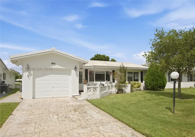 Photo 1 of Single family home for sale at 8543 Nw 13th Court, Plantation, FL 33322 | MLS# A12086518 | Listing updated on 2026-10-08