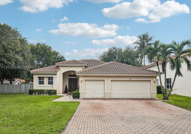 Photo 2 of Single family home for sale at 5212 N 51st Street, Coconut Creek, FL 33073 | MLS# A12090380 | Listing updated on 2026-10-09