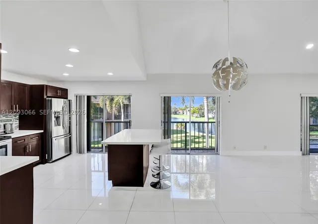 Photo 3 of Condo for sale at 7581 Nw 86th Terrace #201, Tamarac, FL 33321 | MLS# A12093066 | Listing updated on 2026-10-07
