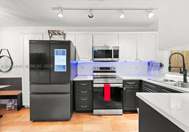 Photo 3 of Townhouse for sale at 458 Se 11th Terrace, Dania Beach, FL 33004 | MLS# A12093440 | Listing updated on 2026-10-10