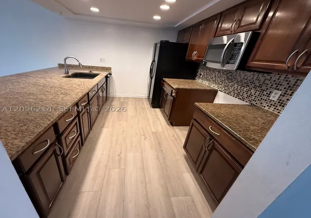 Photo 1 of Townhouse for sale at 13370 SW 89th Terrace #F, Miami, FL 33186 | MLS# A12096214 | Listing updated on 2026-09-27
