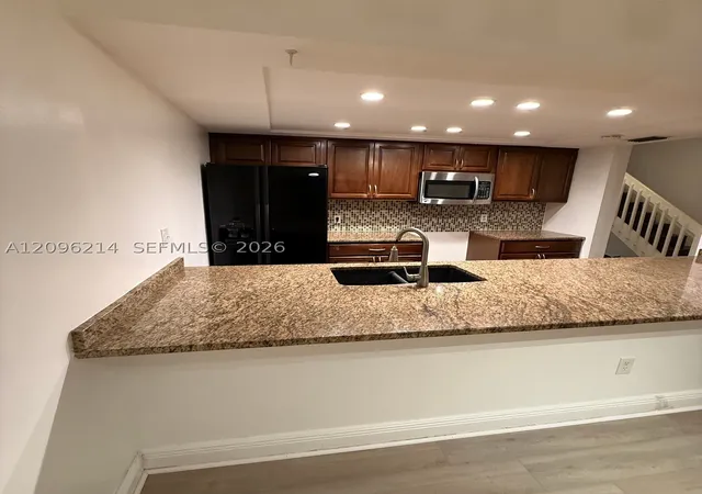 Photo 3 of Townhouse for sale at 13370 SW 89th Terrace #F, Miami, FL 33186 | MLS# A12096214 | Listing updated on 2026-09-27