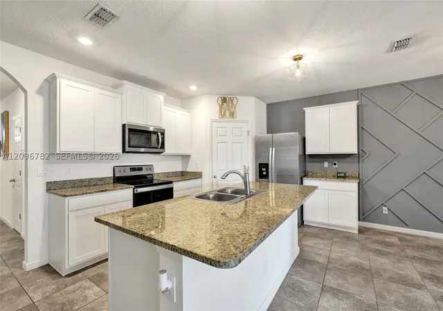 Photo 3 of Single family home for sale at 6479 Nw Castlebrook Ave, Port St Lucie, FL 34983 | MLS# A12096782 | Listing updated on 2026-09-28