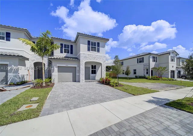 Photo 2 of Townhouse for sale at 11881 Nw 47th Mnr, Coral Springs, FL 33076 | MLS# A12096682 | Listing updated on 2026-10-02