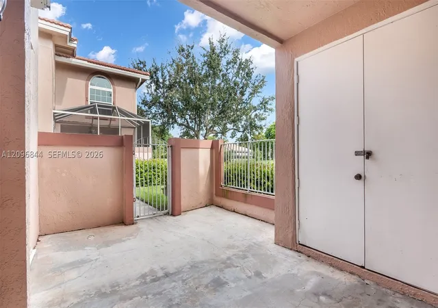 Photo 3 of Townhouse for sale at 11808 Royal Palm Blvd, Coral Springs, FL 33065 | MLS# A12096844 | Listing updated on 2026-10-11