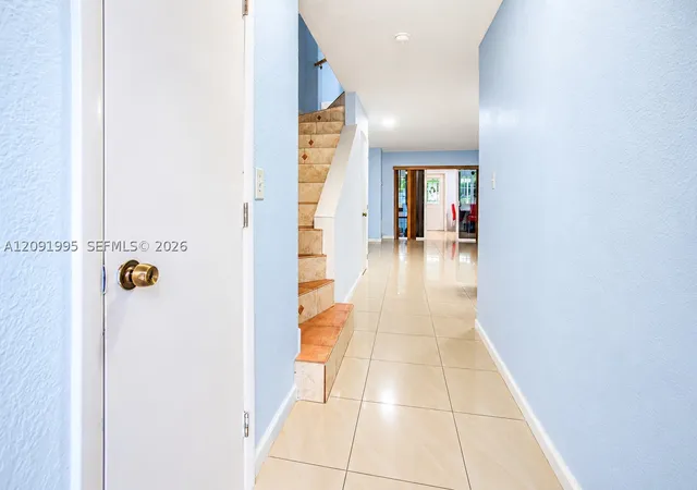 Photo 3 of Townhouse for sale at 7000 W 15th Court, Hialeah, FL 33014 | MLS# A12091995 | Listing updated on 2026-09-30