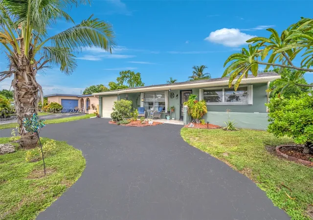 Photo 2 of Single family home for sale at 9261 Nw 24th Place, Sunrise, FL 33322 | MLS# A12095747 | Listing updated on 2026-10-10