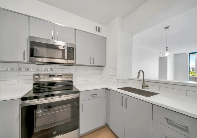 Photo 1 of Condo for sale at 501 Sw 1st Street #502, Miami, FL 33130 | MLS# A12098386 | Listing updated on 2026-10-01