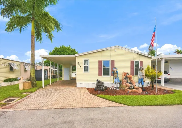 Photo 1 of Manufactured home for sale at 3054 Lakeshore Dr, Dania Beach, FL 33312 | MLS# A12094437 | Listing updated on 2026-10-11