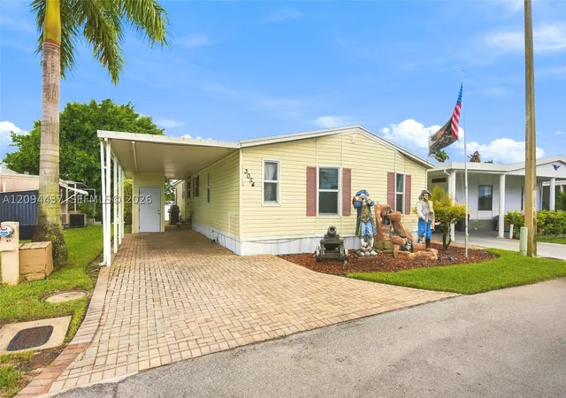 Photo 2 of Manufactured home for sale at 3054 Lakeshore Dr, Dania Beach, FL 33312 | MLS# A12094437 | Listing updated on 2026-10-11
