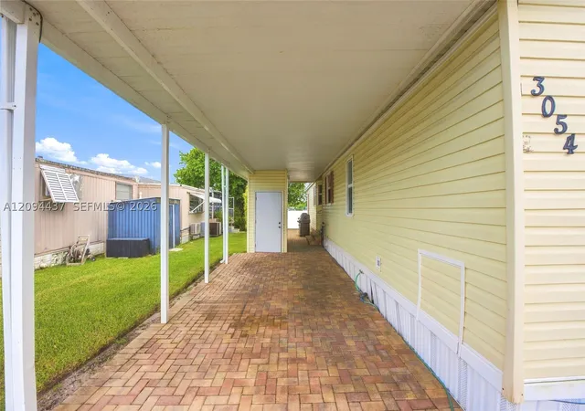 Photo 3 of Manufactured home for sale at 3054 Lakeshore Dr, Dania Beach, FL 33312 | MLS# A12094437 | Listing updated on 2026-10-11