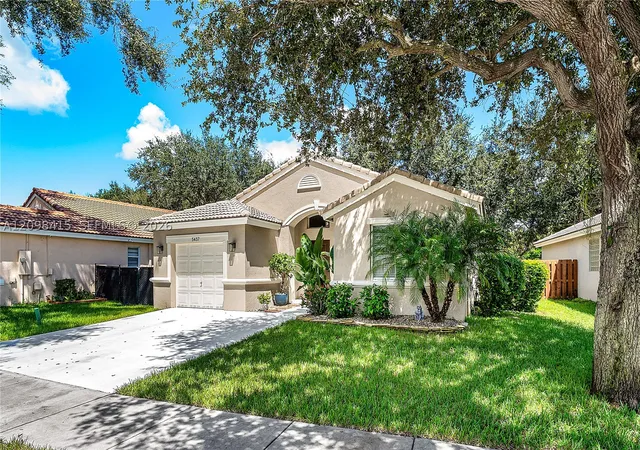 Photo 2 of Single family home for sale at 5437 50th Ct, Coconut Creek, FL 33073 | MLS# A12098415 | Listing updated on 2026-10-10