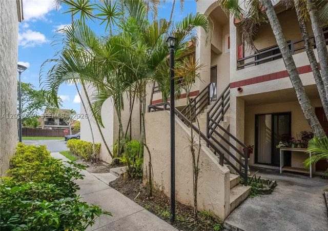 Listing Photo 1 - Condo for sale at Quatraine Ii, Unit 6 20150 NE 3rd Court, Quatraine Ii, Miami, FL 33179 | Built Year: 1983-1984