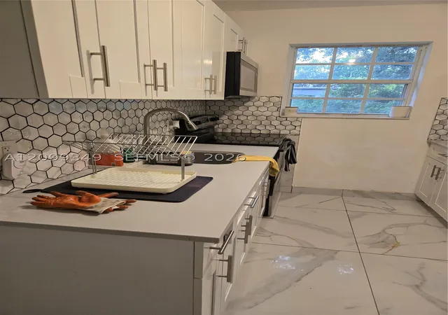 Photo 3 of Single family home for sale at 1943 Nw 98th Street, Miami, FL 33147 | MLS# A12099349 | Listing updated on 2026-10-02