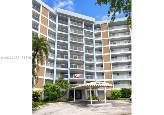 Photo 1 of Condo for sale at 2940 N Course Dr #110, Pompano Beach, FL 33069 | MLS# A12099368 | Listing updated on 2026-10-02