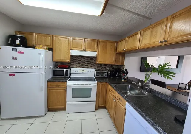 Condo for sale at 165 NW 93rd Avenue #102, Pembroke Pines, FL 33024 | MLS# A12099420