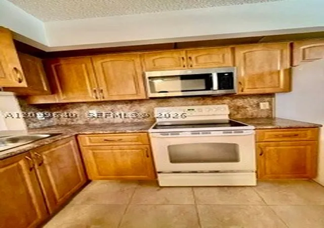Photo 2 of Condo for sale at 112 Lake Emerald Dr #109, Oakland Park, FL 33309 | MLS# A12099640 | Listing updated on 2026-10-05