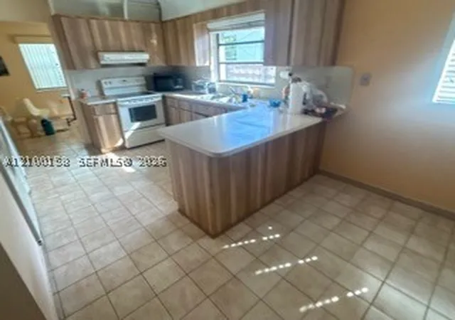 Photo 2 of Multi family home for sale at 3404 Sw 14th Street, Miami, FL 33145 | MLS# A12100158 | Listing updated on 2026-10-05