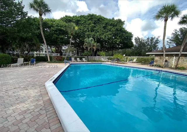 Photo 2 of Condo for sale at 2650 S Course Dr #110, Pompano Beach, FL 33069 | MLS# A12098484 | Listing updated on 2026-10-09