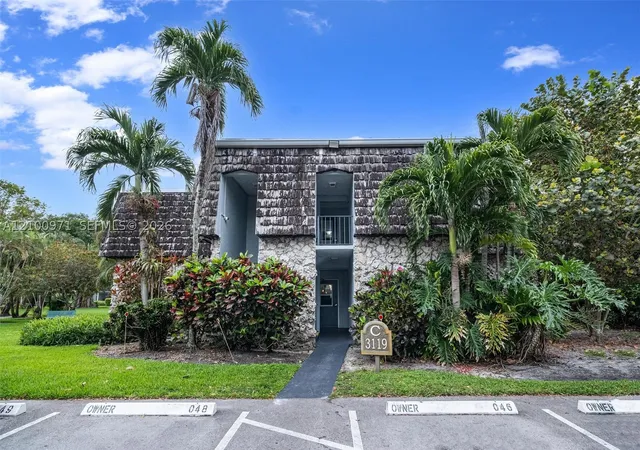 Listing Photo 1 - Condo for sale in building located at 3119 Oakland Shores Dr, Oakland Park, FL 33309 - Unit #C204