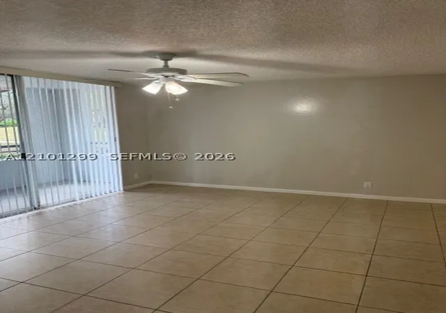 Photo 2 of Condo for sale at 631 Lyons Rd #12101, Coconut Creek, FL 33063 | MLS# A12101299 | Listing updated on 2026-10-06