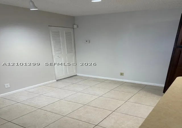 Photo 3 of Condo for sale at 631 Lyons Rd #12101, Coconut Creek, FL 33063 | MLS# A12101299 | Listing updated on 2026-10-06