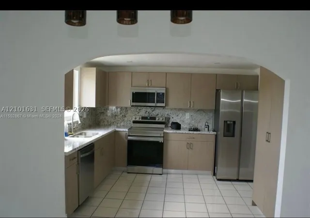 Photo 3 of Townhouse for sale at 9030 Sw 203rd Terrace, Cutler Bay, FL 33189 | MLS# A12101631 | Listing updated on 2026-10-06