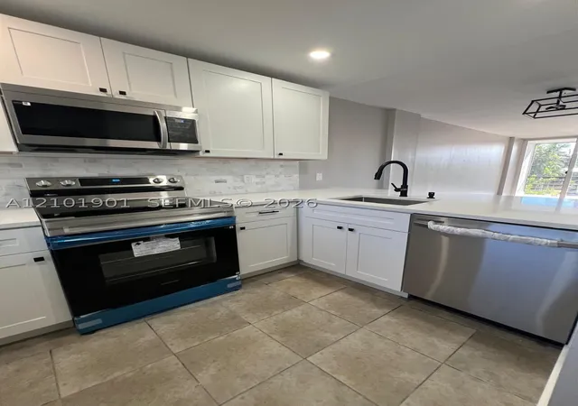 Photo 3 of Condo for sale at 108 Royal Park Dr #2H, Oakland Park, FL 33309 | MLS# A12101901 | Listing updated on 2026-10-10