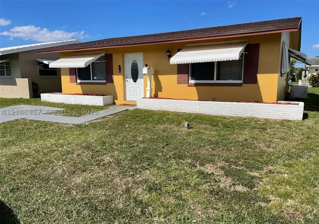 Photo 2 of Single family home for sale at 4929 Nw 54th Court, Tamarac, FL 33319 | MLS# A12101157 | Listing updated on 2026-10-07