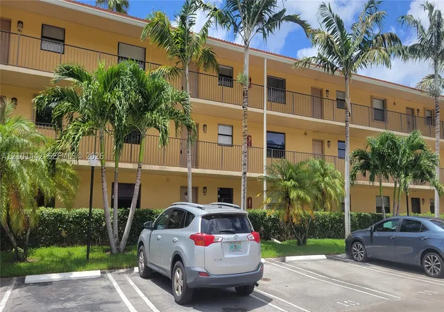 Photo 1 of Condo for sale at 11477 NW 39th Court #202-1, Pompano Beach, FL 33065 | MLS# A12101442 | Listing updated on 2026-10-07