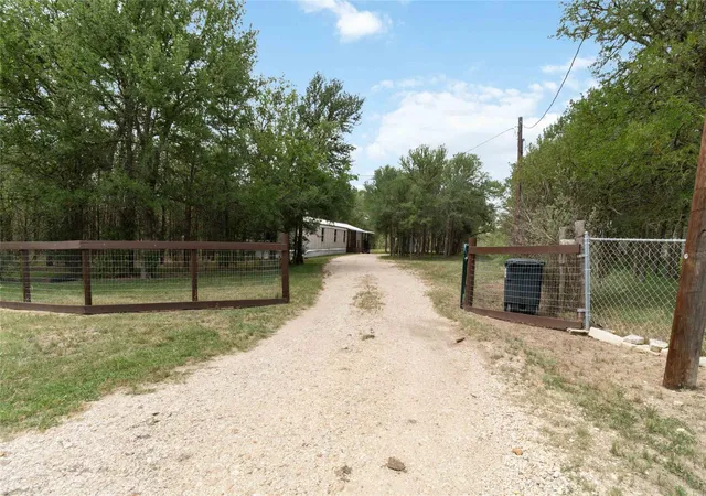 Photo 1 of Manufactured home for sale at 153 Cherylton Dr, Red Rock, TX 78662 | MLS# 2937609 | Listing updated on 2026-01-09