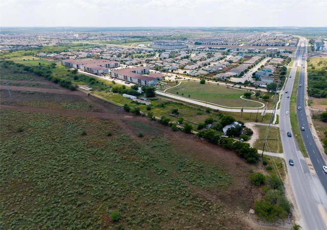 Photo 2 of Land for sale at 6981 Mckinney Fls Pkwy, Austin, TX 78744 | MLS# 6690848 | Listing updated on 2026-08-24