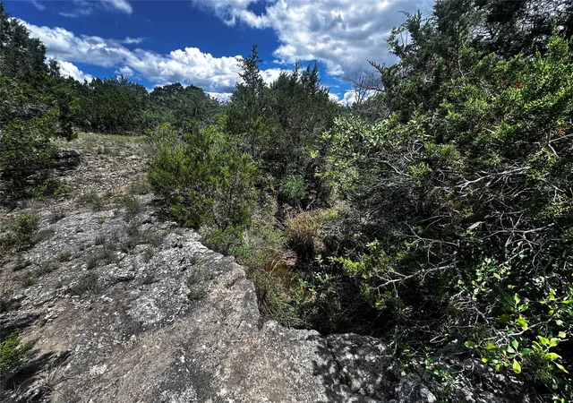 Photo 1 of Land for sale at 21114 Bertram Ln, Spicewood, TX 78669 | MLS# 1846874 | Listing updated on 2026-07-25