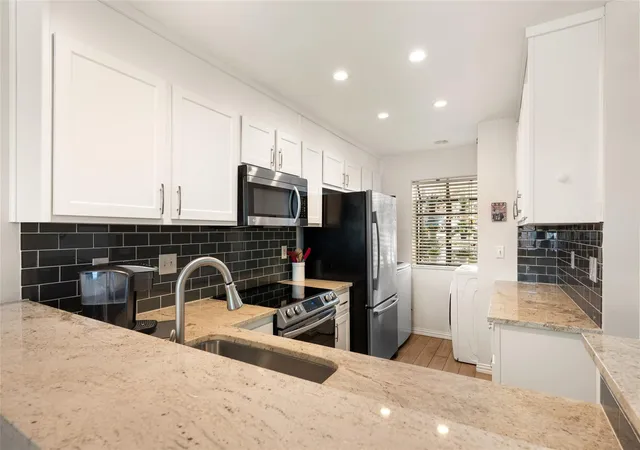 Photo 2 of Condo for sale at 7122 Wood Holw Dr #47, Austin, TX 78731 | MLS# 8004551 | Listing updated on 2026-10-24