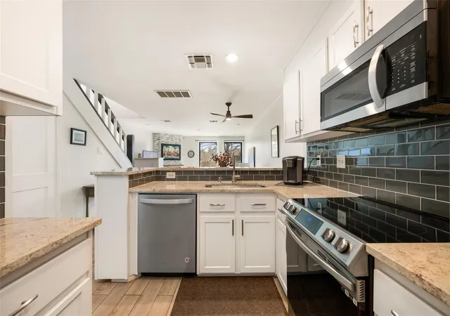 Photo 3 of Condo for sale at 7122 Wood Holw Dr #47, Austin, TX 78731 | MLS# 8004551 | Listing updated on 2026-10-24