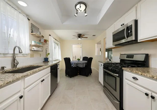Photo 4 of Single family home for sale at 1408 Doonesbury Dr, Austin, TX 78758 | MLS# 7415977 | Listing updated on 2026-09-19