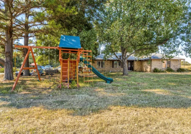 1st image of 610 Pleasant Grove Rd, Elgin, TX 78621 | MLS# 2409570