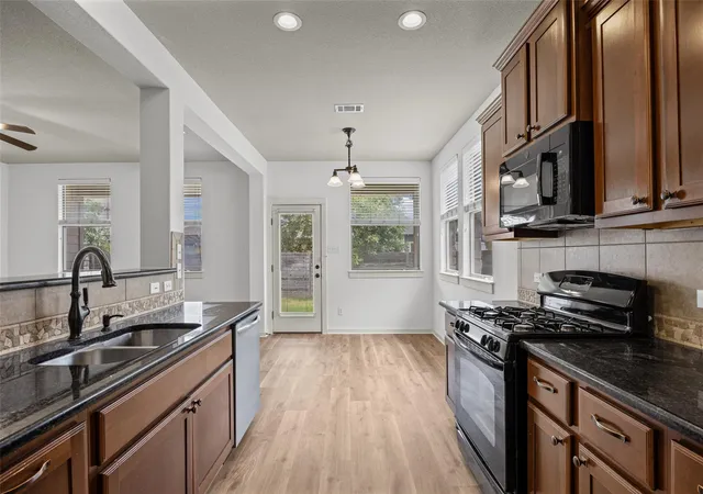 Photo 2 of Single family home for sale at 331 Rosemary Holw, Buda, TX 78610 | MLS# 3437393 | Listing updated on 2026-09-30