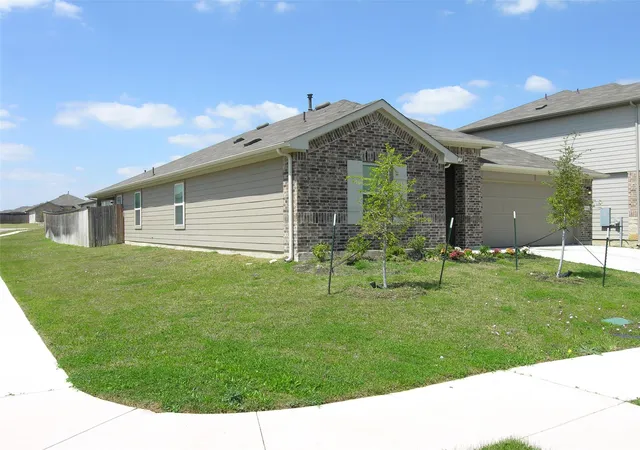 Photo 2 of Single family home for sale at 13700 Dismuke Dr, Manor, TX 78653 | MLS# 7470789 | Listing updated on 2026-03-31